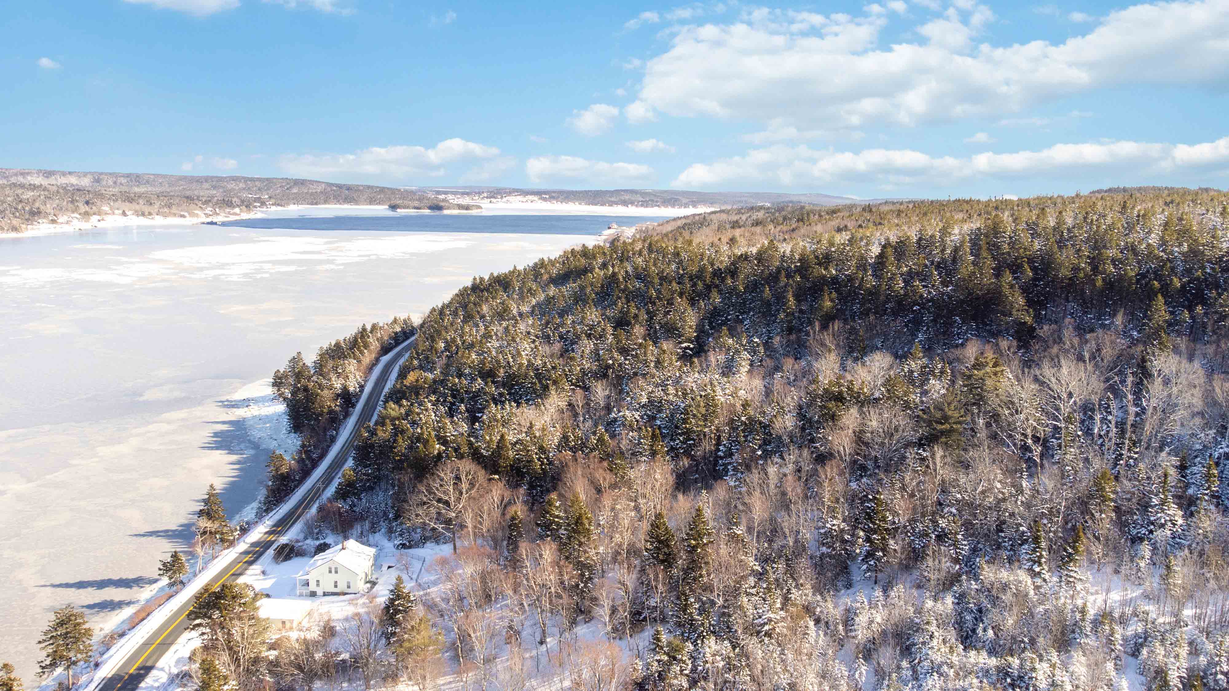 Stunning riverfront retreat in Nova Scotia, showcasing a timeless home with scenic views and serene surroundings.