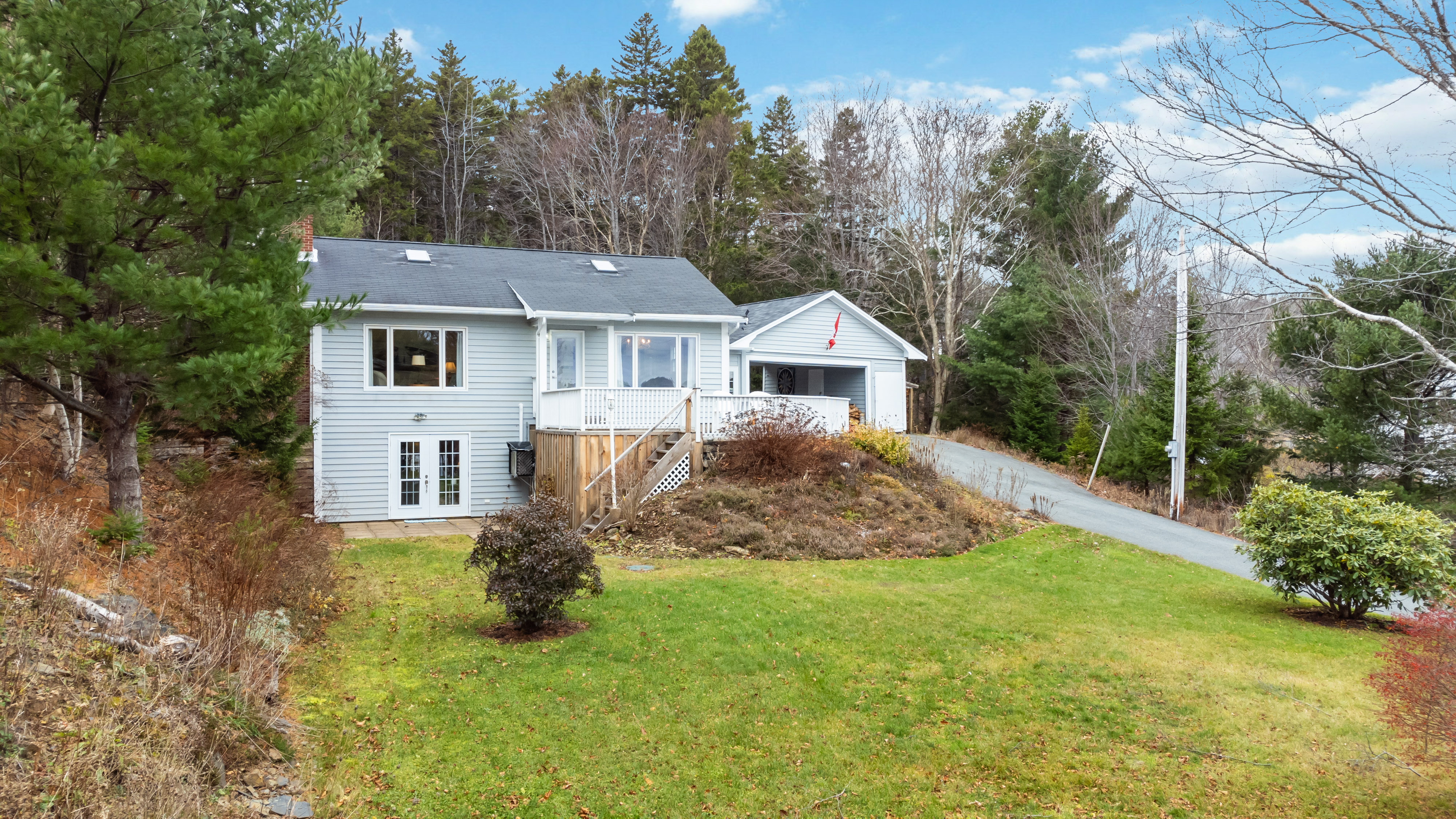 Charming riverfront homes in West LaHave, showcasing peaceful waterfront living and scenic views.